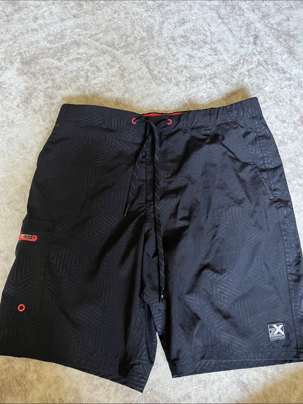 ZeroXposur Black Swim Board Shorts with Red Accents